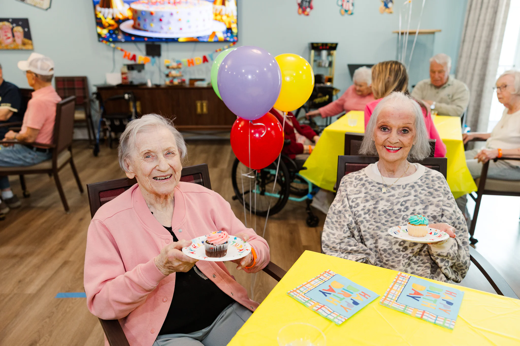 Residents enjoying social activities at Emory Mills