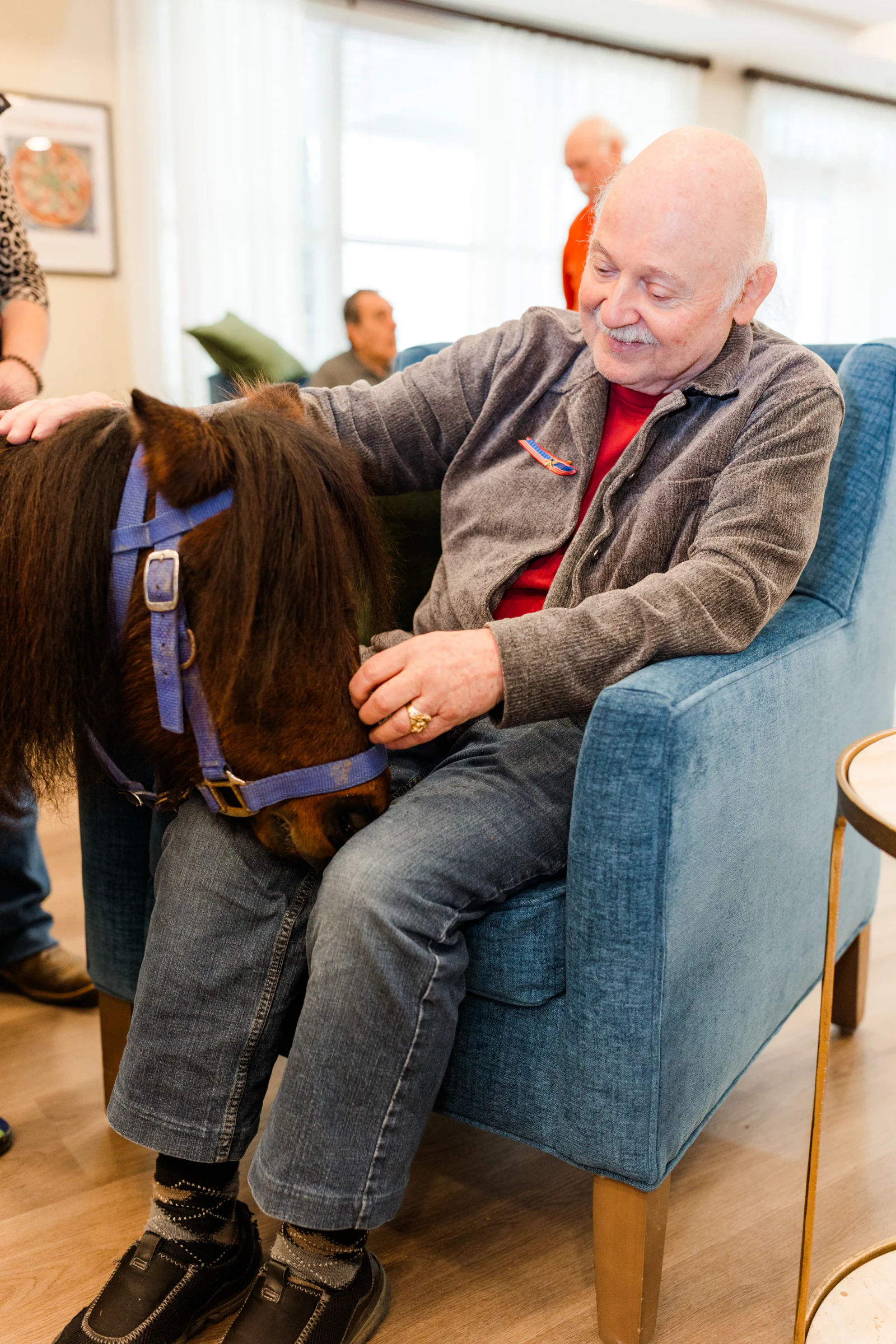 Family visiting memory care resident at Emory Mills