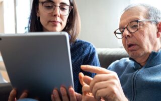 Photo of seniors on the computer