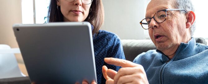 Photo of seniors on the computer