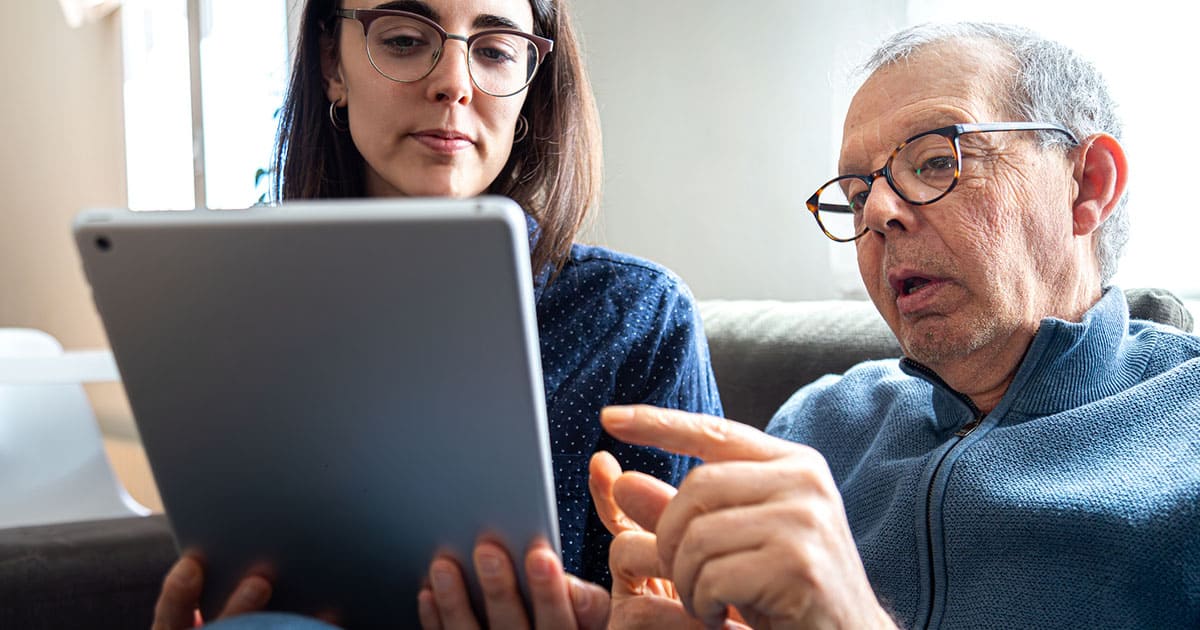 Photo of seniors on the computer