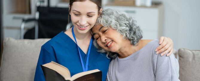 Photo of a senior female with a staff member